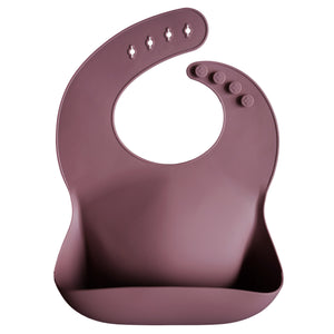 Open image in slideshow, Mushie Silicone Bib - Solid Colour
